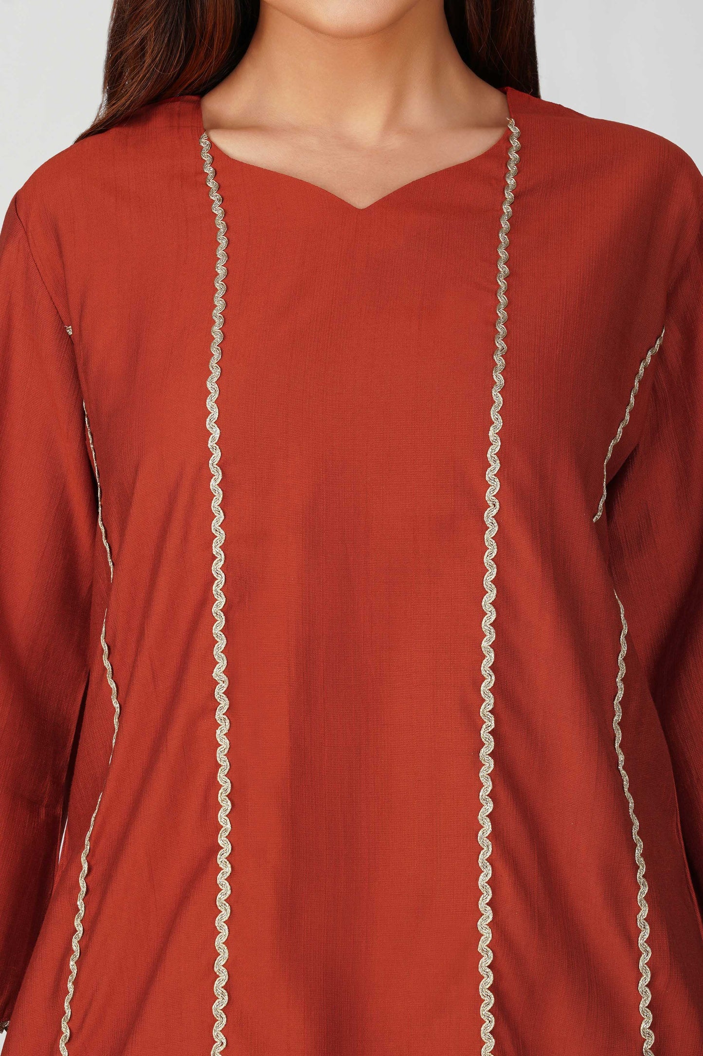Cham Cham Co-ord Set – Rust Orange | Elegant V-Neck Short Kurta with Gold Threads – Bindigasm