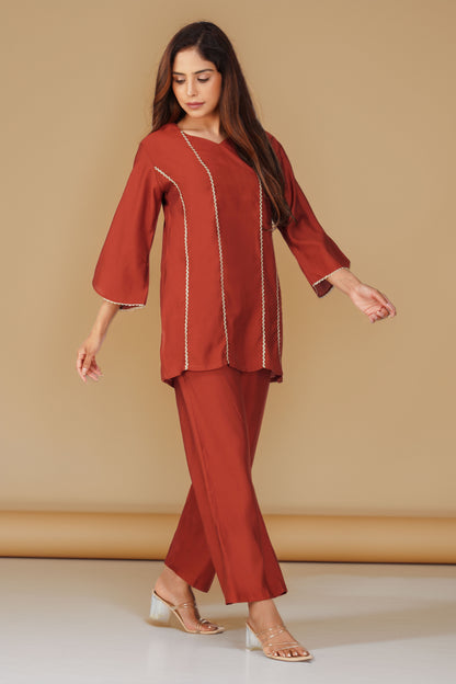 Cham Cham Co-ord Set – Rust Orange | Elegant V-Neck Short Kurta with Gold Threads – Bindigasm